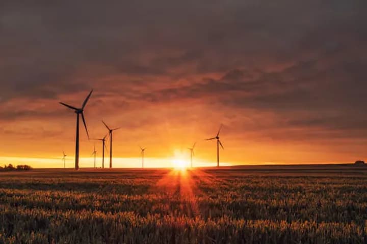 Wind turbines over farmland